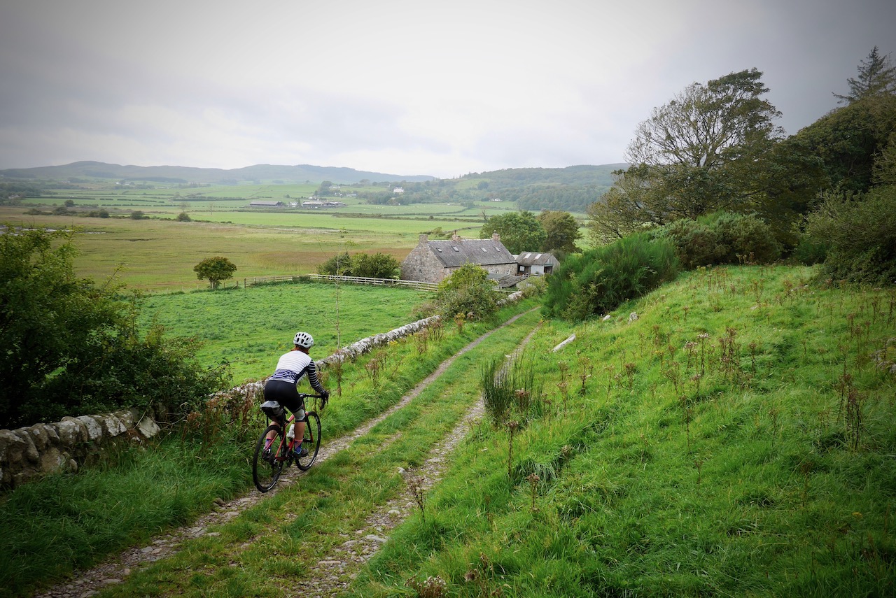 cyclist cycling down country cycle routes